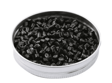 A metal container filled with black plastic pellets.