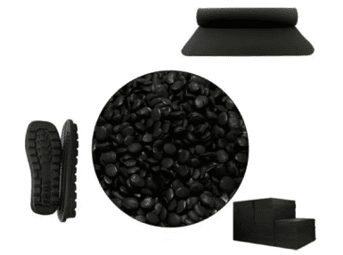 A black background with some black rocks and other items