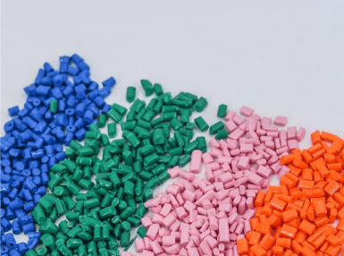 A group of different colored plastic granules.