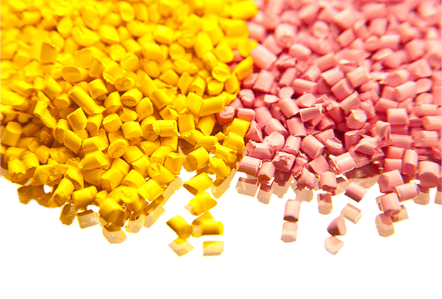 A close up of yellow and pink candy